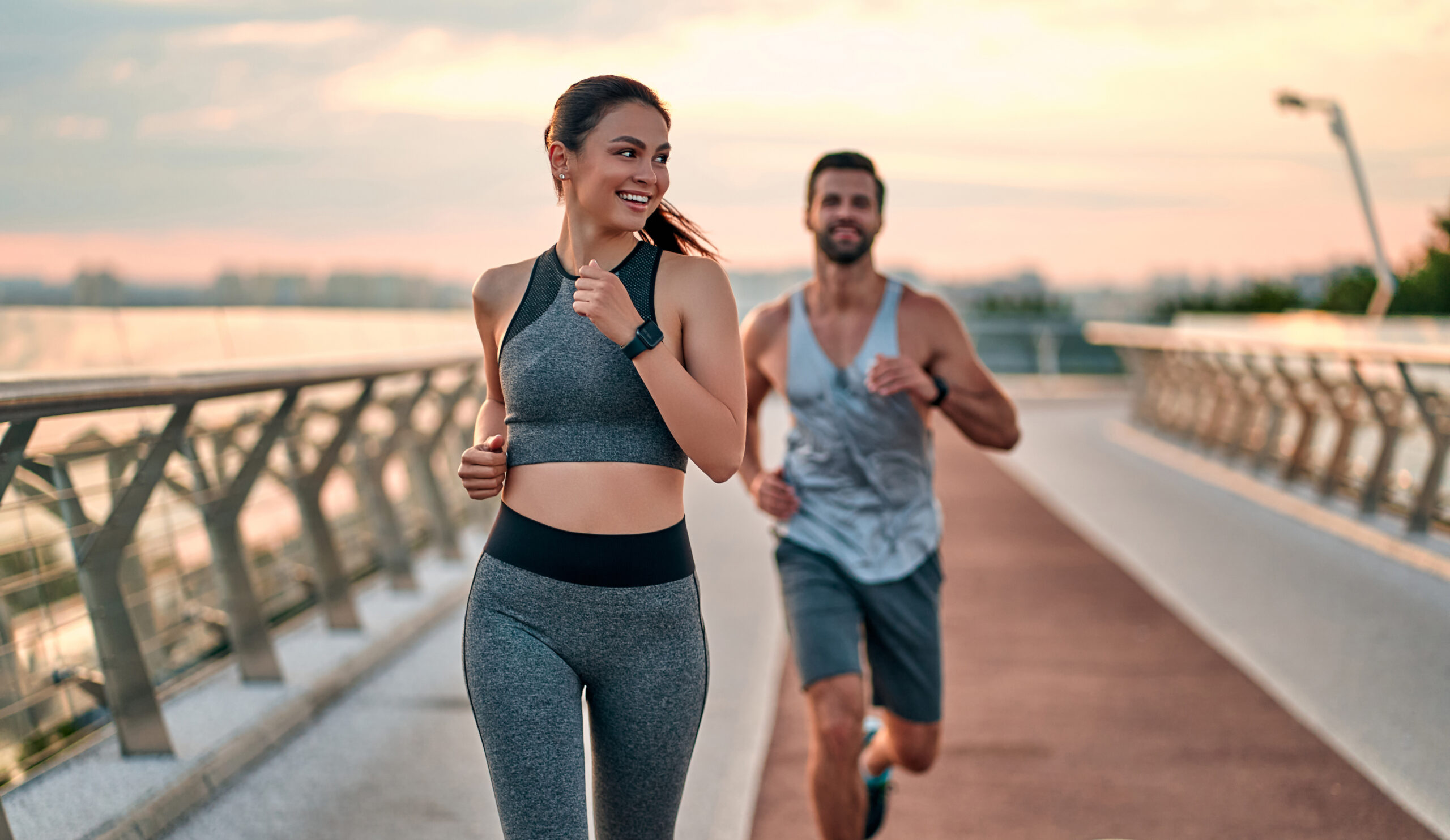 couple-jogging-together-at-sunset
