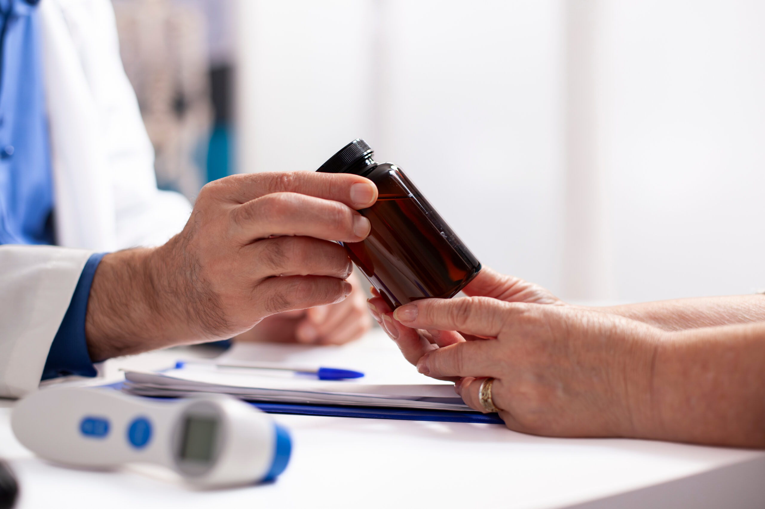 white-people-holding-bottle-pills